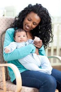 Girl Holding baby